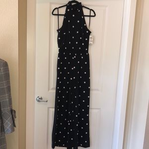 INC black and white polkadot jumpsuit.